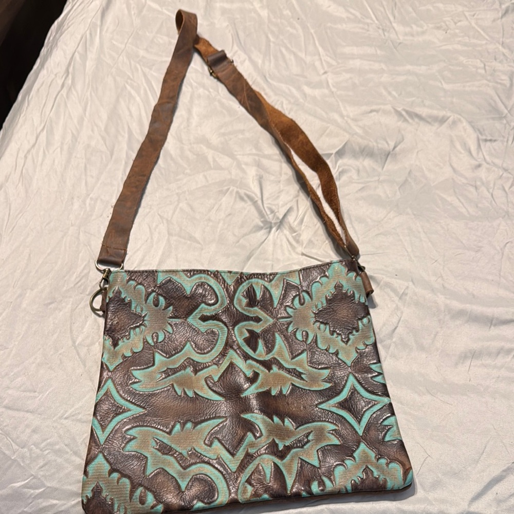 Brown and Blue Crossbody Bag with Floral Pattern and Adjustable Strap